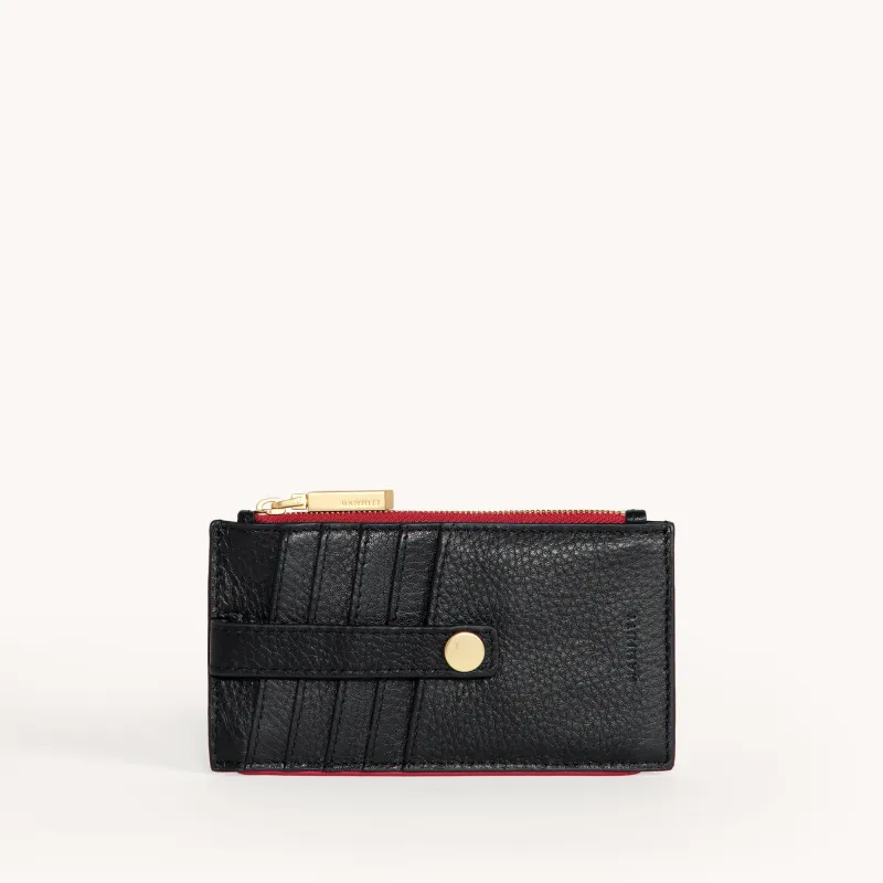 210 West | Black/Brushed Gold Red Zip sold by Hammitt