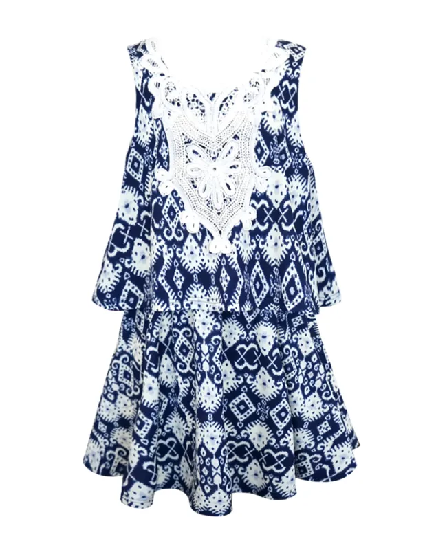 LAYERED SEMI-CIRCLE DRESS W/ V-BACK AND TRIM DETAIL. made by Truly Me