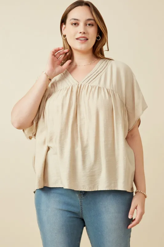 Womens Textured Pleated V Neck Dolman Sleeve Top sold by Hayden