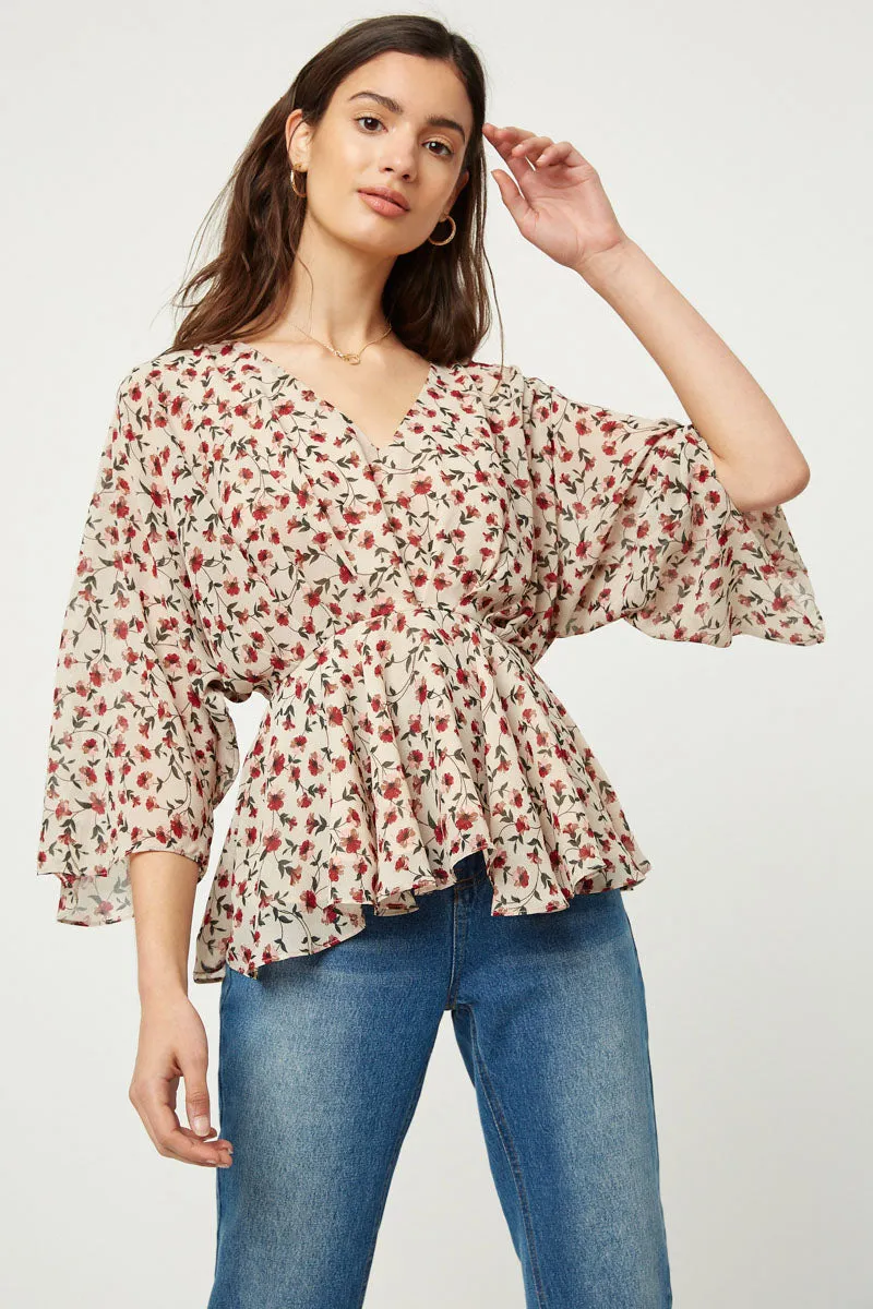 Womens Dolman Sleeve Floral Peplum Top sold by Hayden