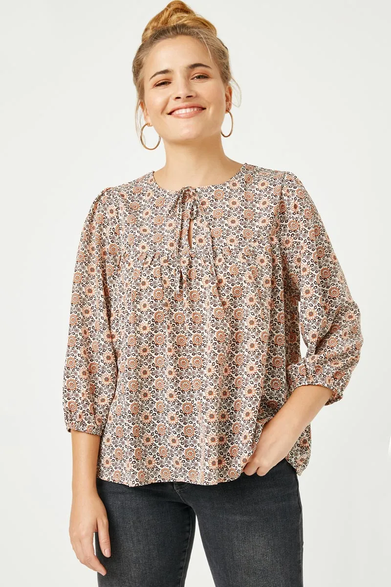 Womens Tie Neck Floral Printed Peasant Top sold by Hayden