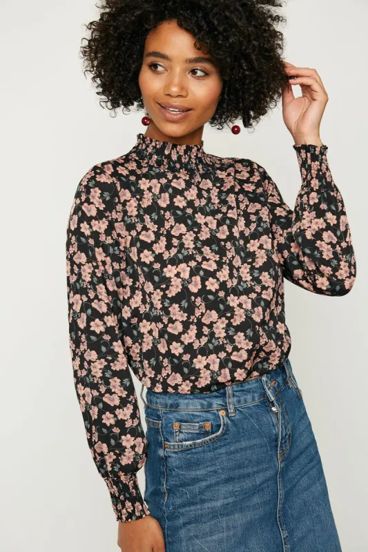 Womens Ruffle Neck Smocked Cuff Top sold by Hayden