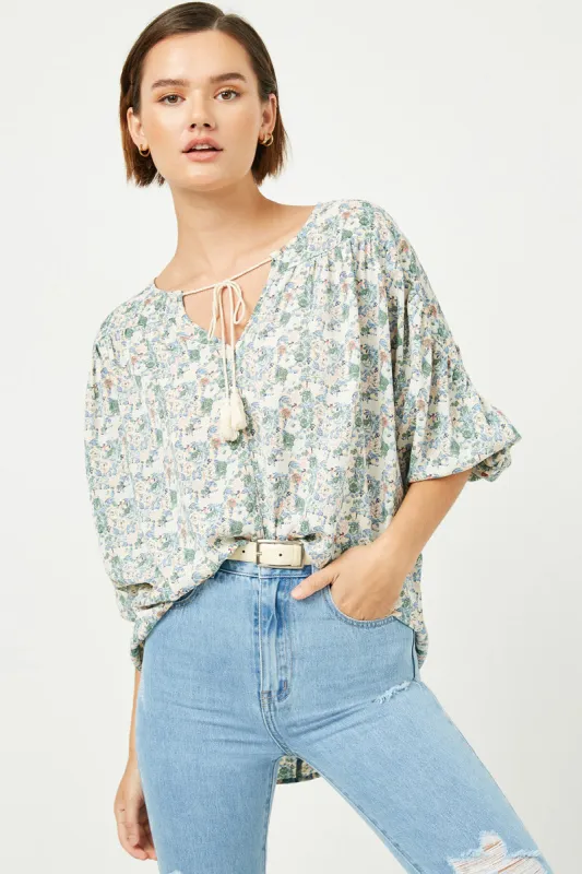 Womens Floral Balloon Sleeve Tassel Tie Top sold by Hayden