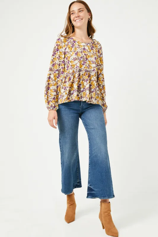 Womens Printed Long Sleeve Wide Neck Peplum Top sold by Hayden