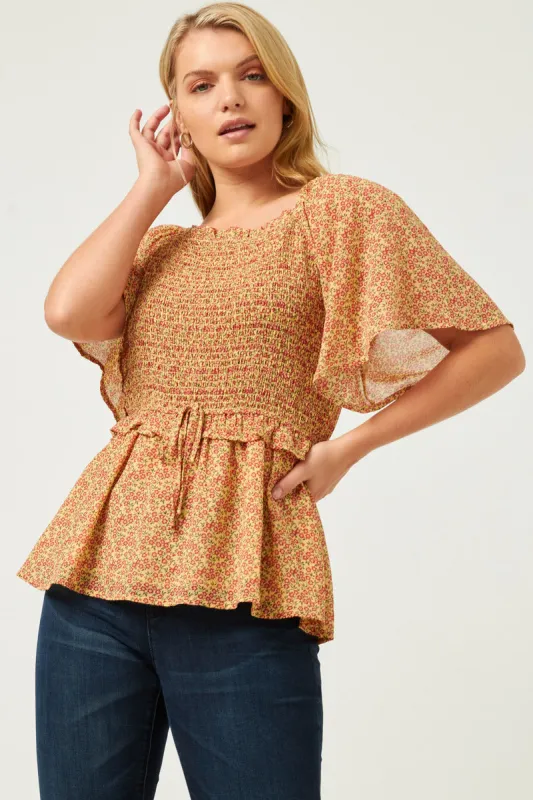 Womens Ditsy Floral Smocked Bust Ruffled Peplum Top sold by Hayden