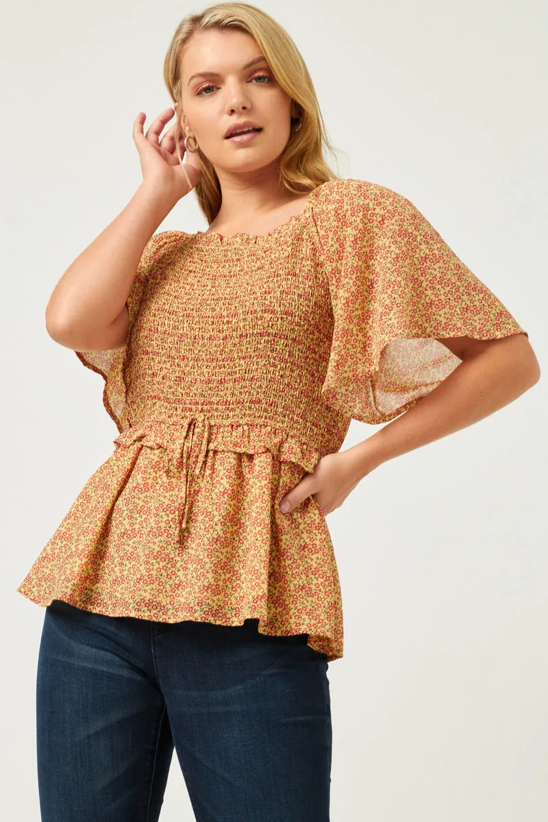 Womens Ditsy Floral Smocked Bust Ruffled Peplum Top sold by Hayden
