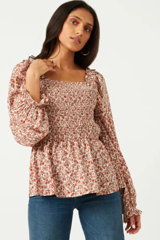 Womens Smocked Bodice Ruffled Shoulder Long Sleeve Top sold by Hayden