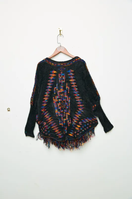 Womens Fringed Geometric Print Sleeved Poncho sold by Hayden