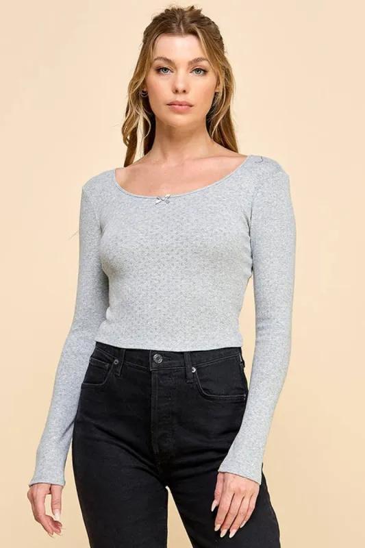 LONG SLEEVE SCOOP NECK POINTELLE TOP W/ BOW DETAIL sold by Heart & Hips