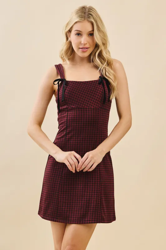 MINI DRESS WITH TIE FRONT BOW sold by Heart & Hips