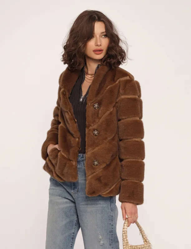 Jayne Coat sold by Heartloom