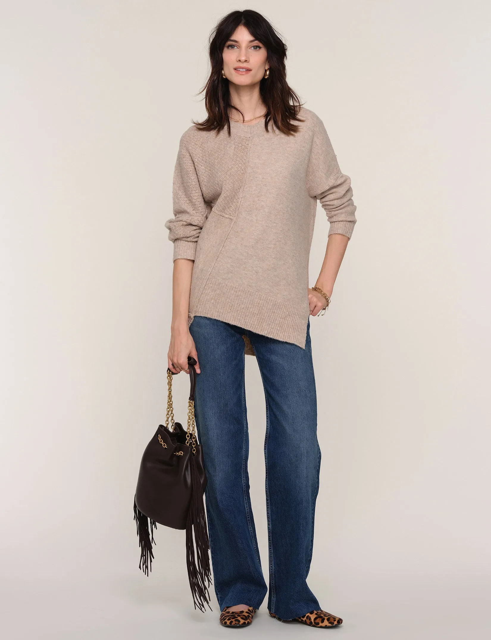 lorde sweater sold by Heartloom