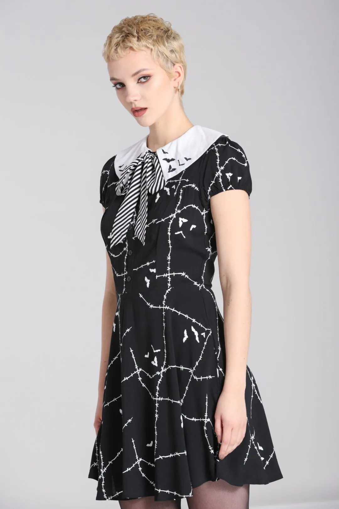 Stitches Mini Dress sold by Hell Bunny