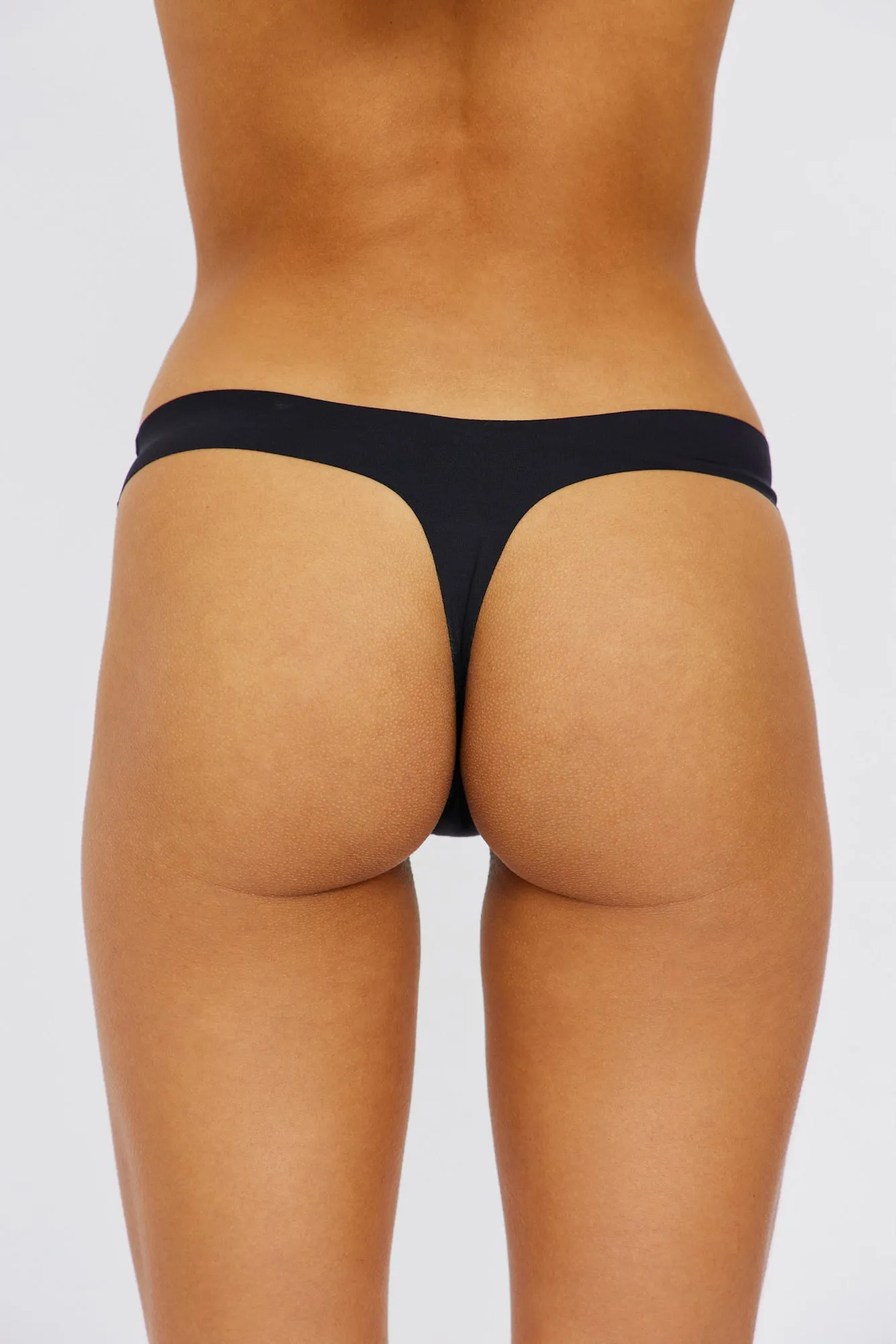 UNDERCOVER Style Helpers Seamless High Cut Thong Black 3 Pack sold by Hello Molly product image thumbnail 5