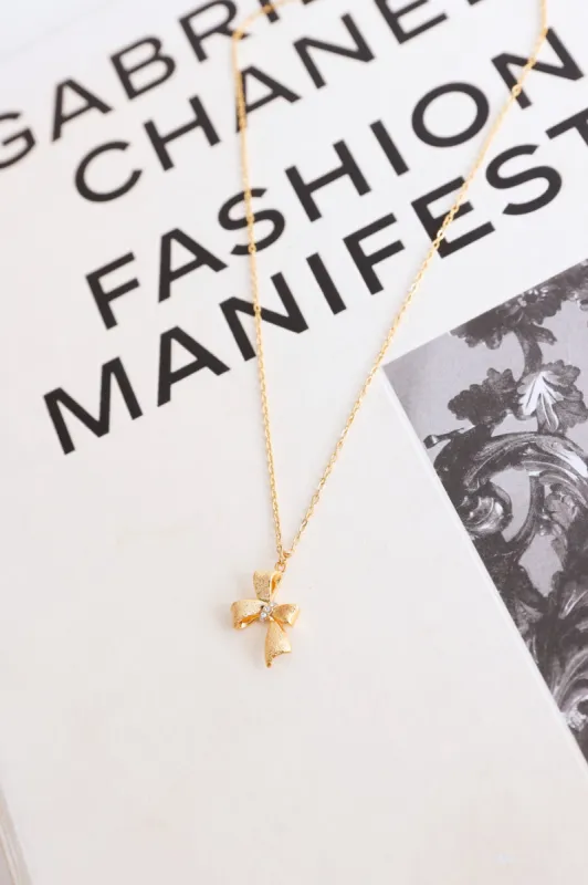 18k Gold Plated Tiny Bow Necklace Gold sold by Hello Molly