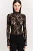 Eira Lace Bodysuit sold by Henne
