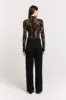 Eira Lace Bodysuit sold by Henne