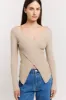 Edie Wrap Knit sold by Henne