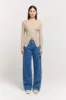 Edie Wrap Knit sold by Henne