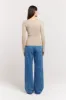 Edie Wrap Knit sold by Henne