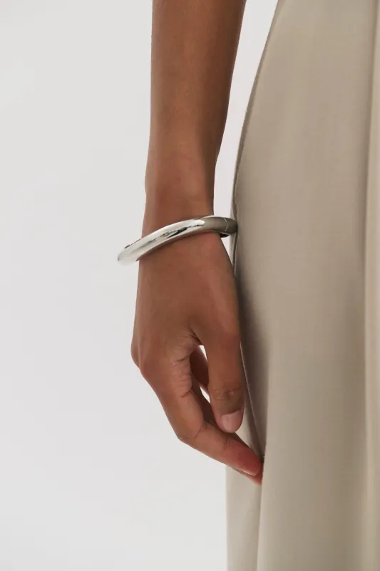 Thin warped Bangle made by Henne