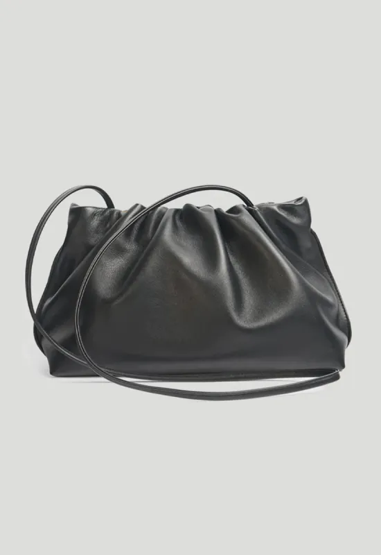 Puffa Clutch sold by Henne