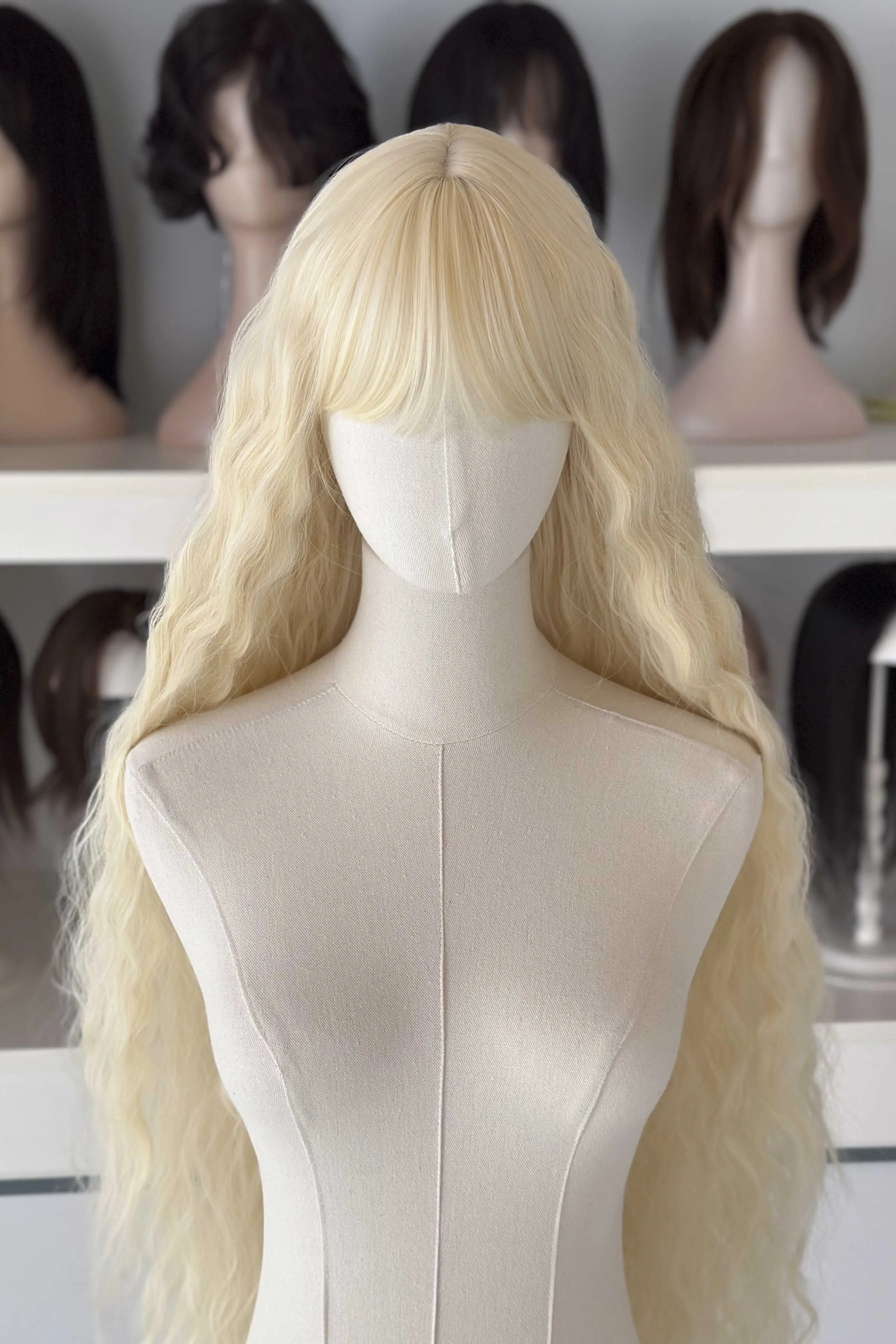 Icy Platinum Blonde Extra Long Wavy Wig with Bangs Luna sold by Her Wig Closet