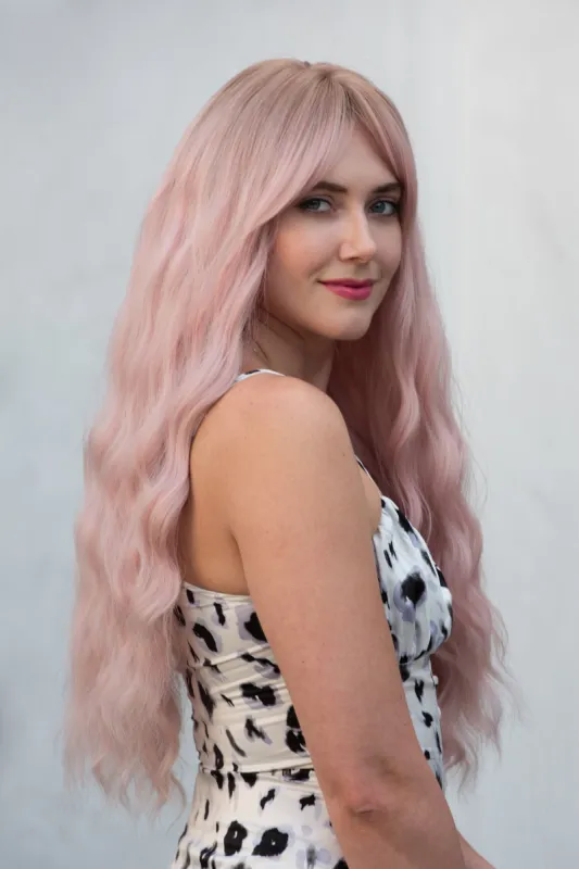 Pastel Pink Long Wavy Wig with Bangs Kaitlyn sold by Her Wig Closet