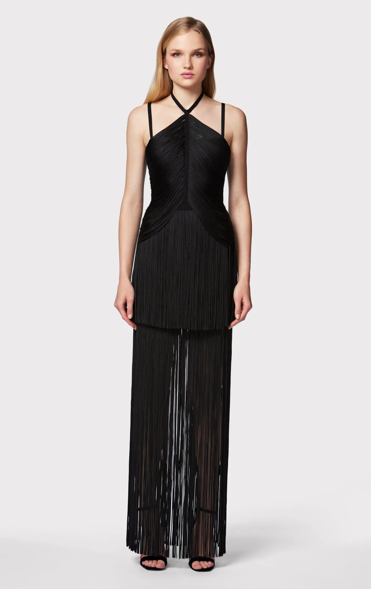 DRAPED FRINGE STRAPPY HALTER GOWN sold by Herve Leger