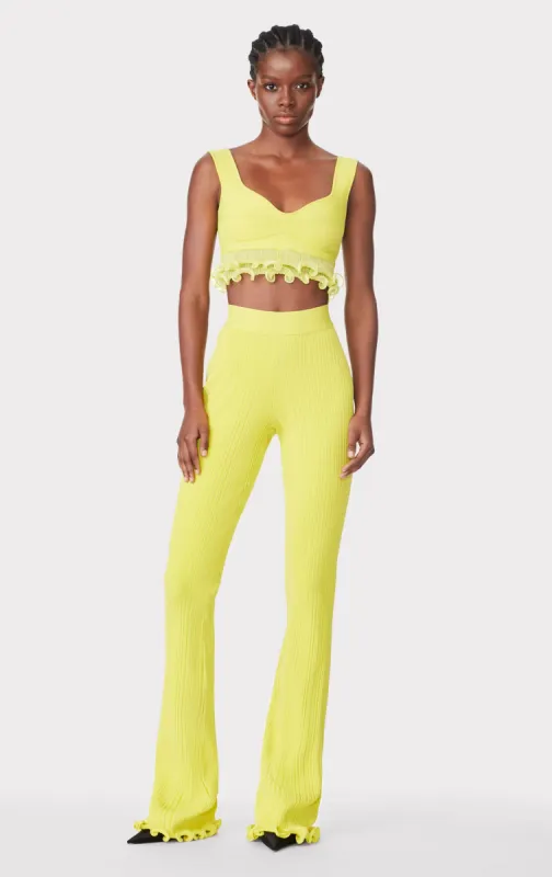 RIBBED PANTS W/ RUFFLED HEM sold by Herve Leger