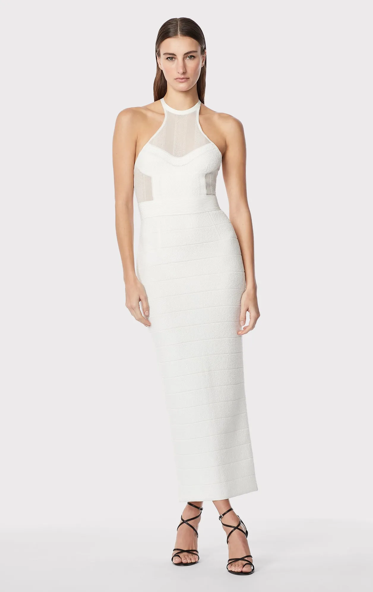 TEXTURED SHEER BUSTIER HALTER GOWN sold by Herve Leger