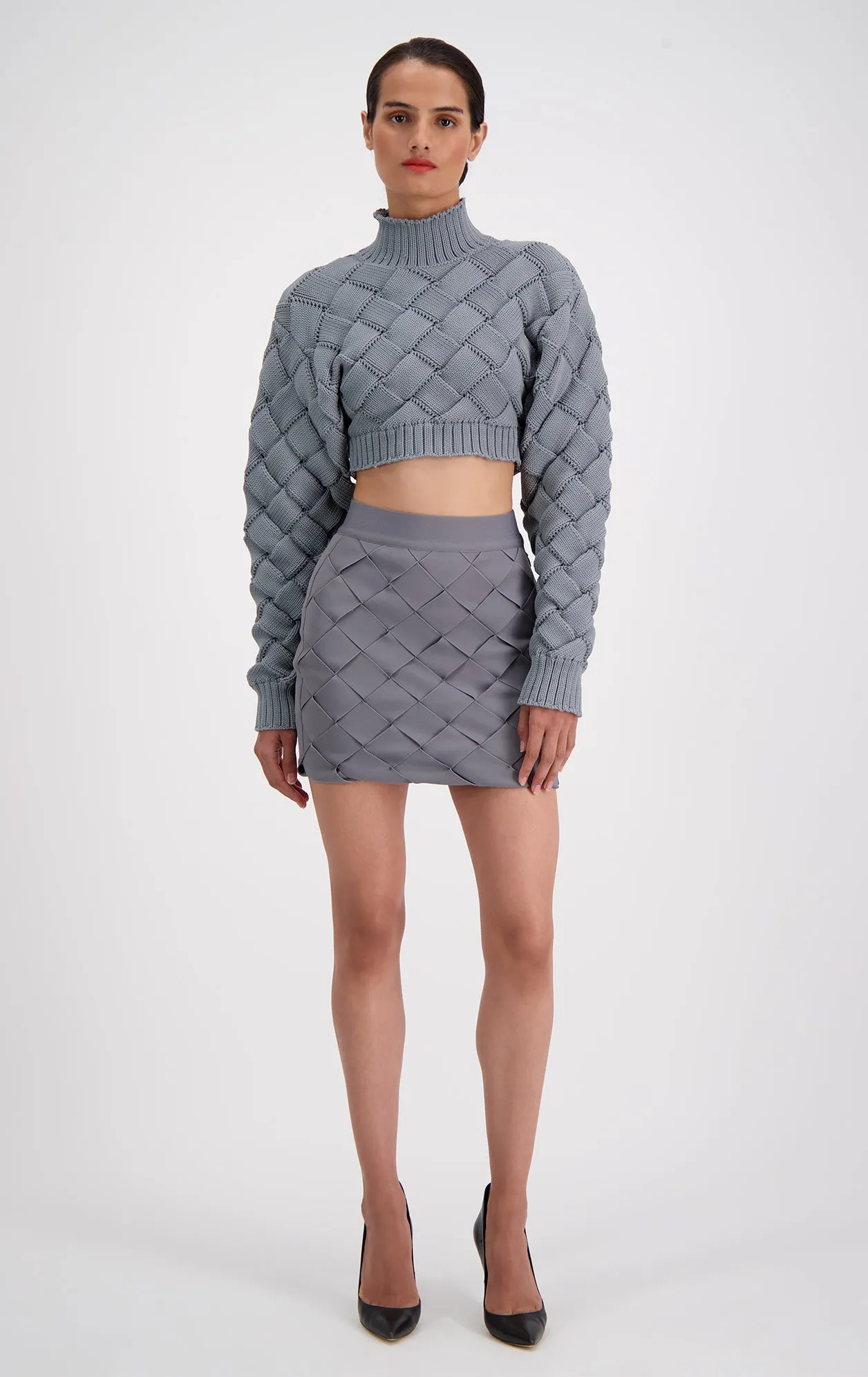 Bandage Weave Mini Skirt sold by Herve Leger