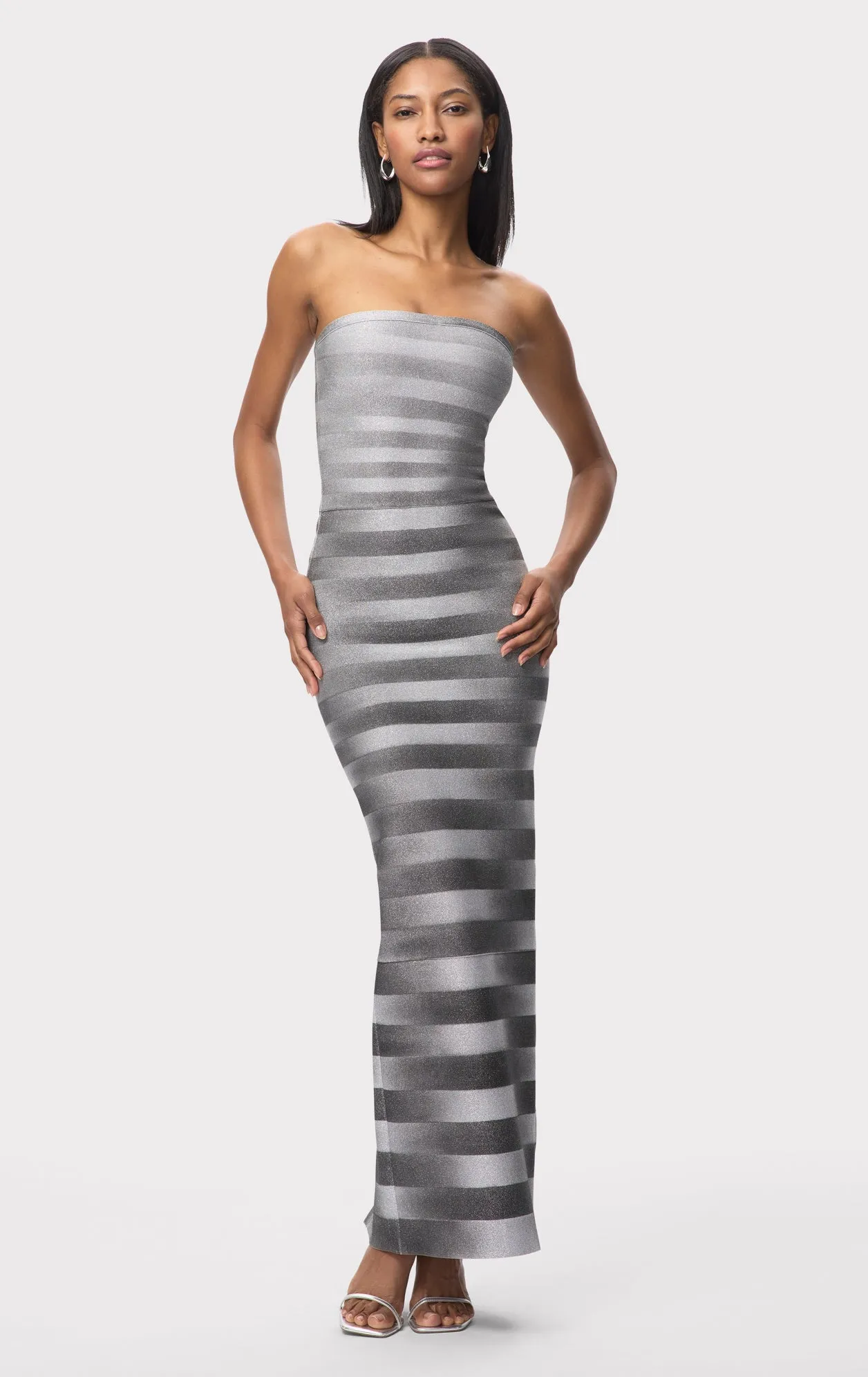 THE NIA GOWN sold by Herve Leger