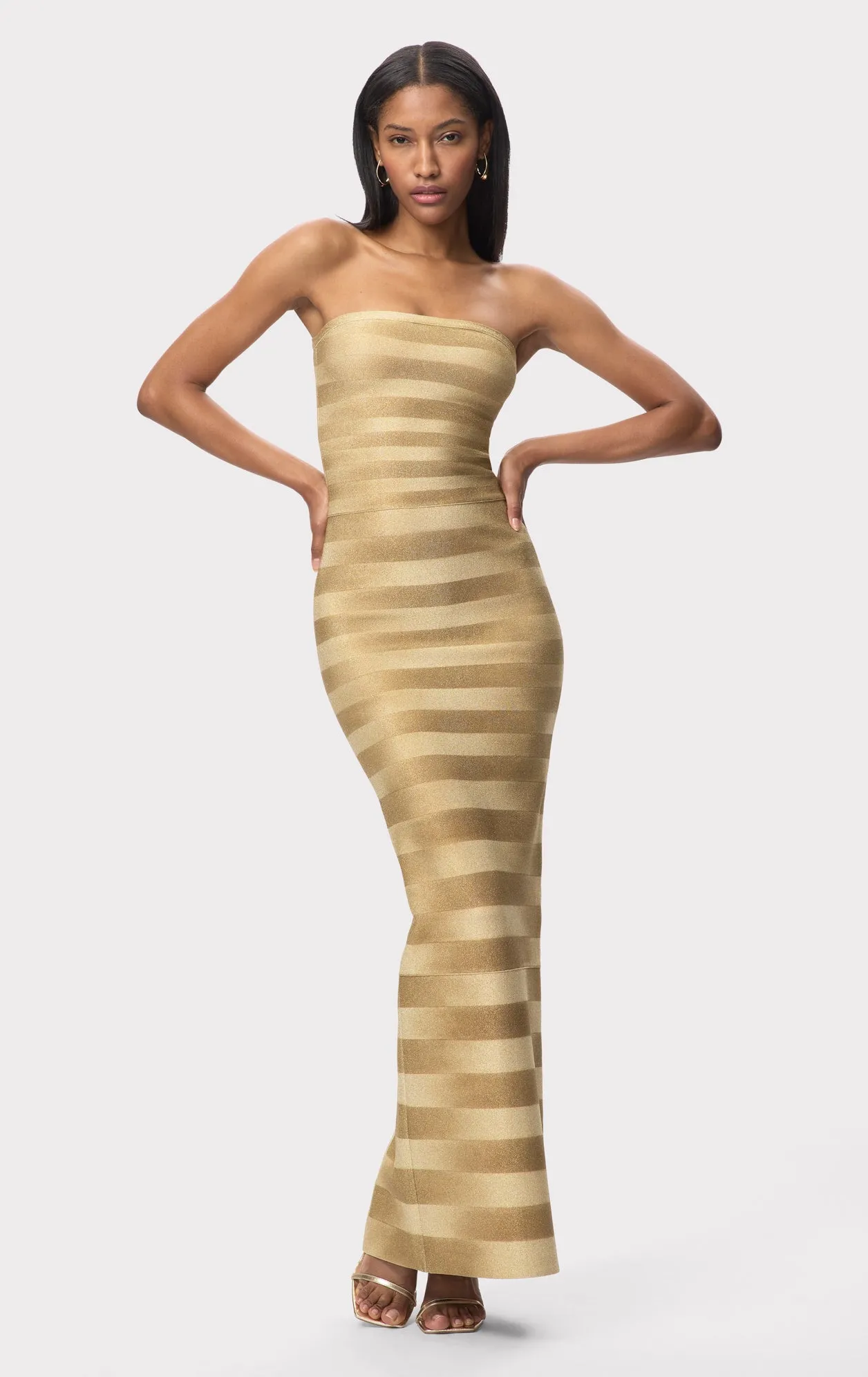 THE NIA GOWN sold by Herve Leger