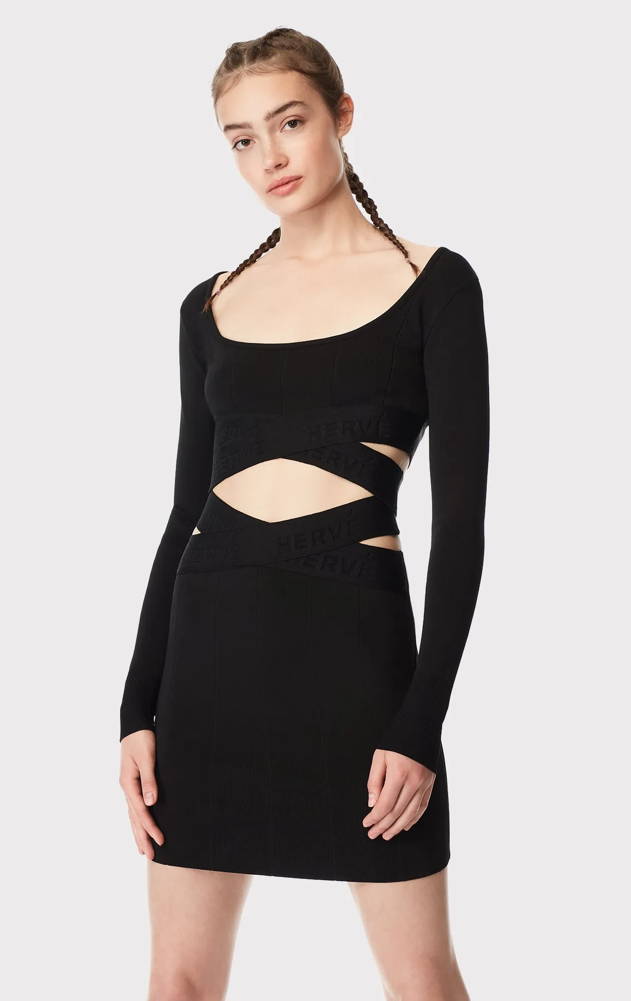 long sleeve scoop neck crop top sold by Herve Leger