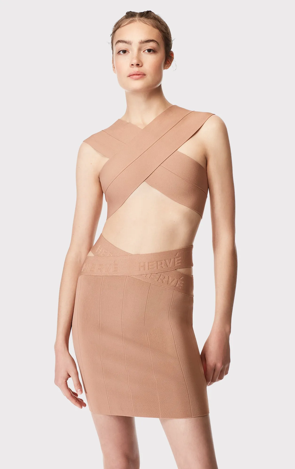 crossover bandage bra top sold by Herve Leger
