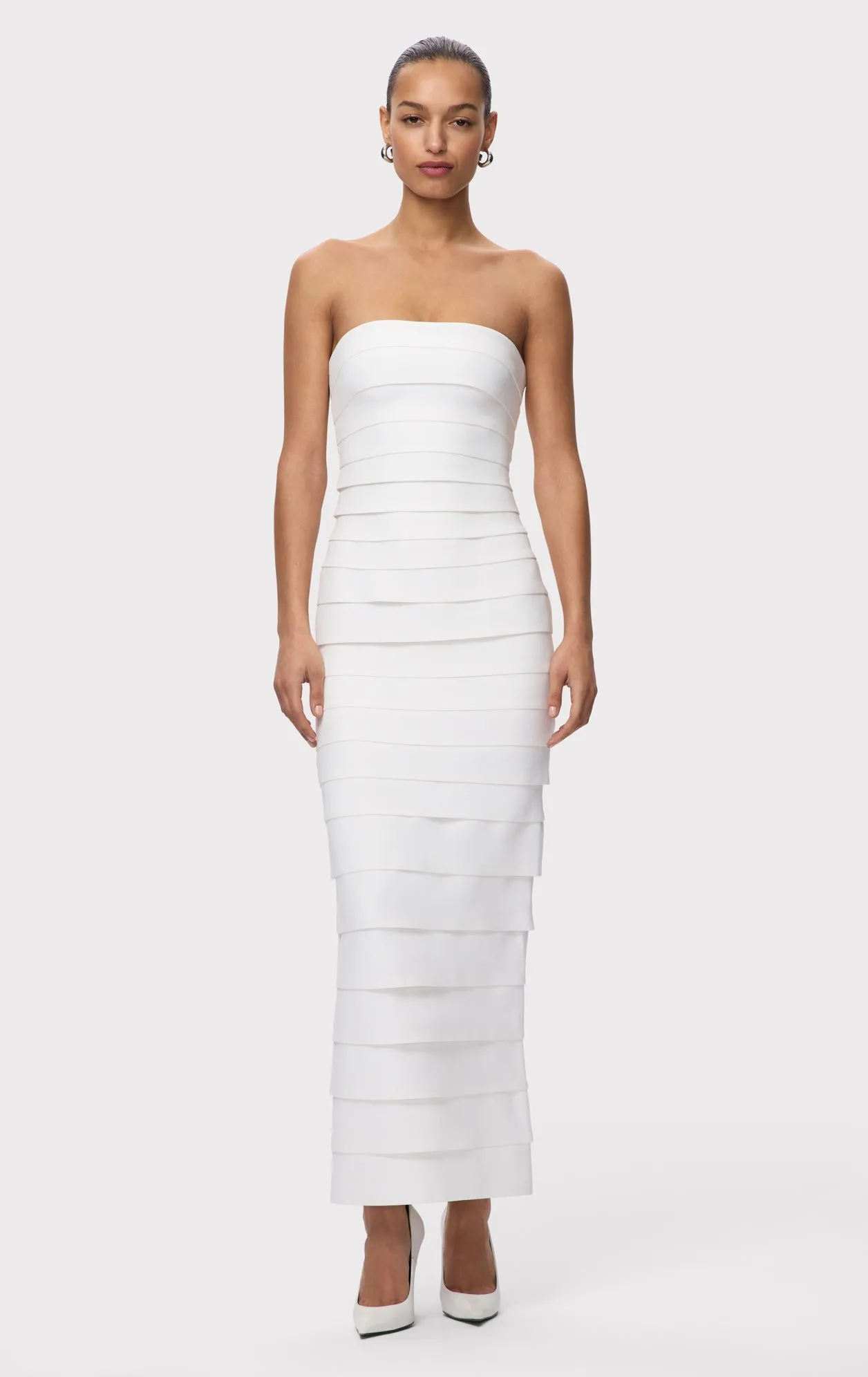 THE ELAINA GOWN sold by Herve Leger