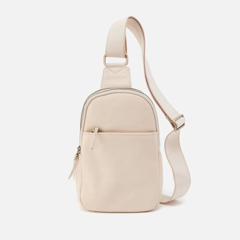 Cass Sling In Pebbled Leather - Cream sold by HOBO
