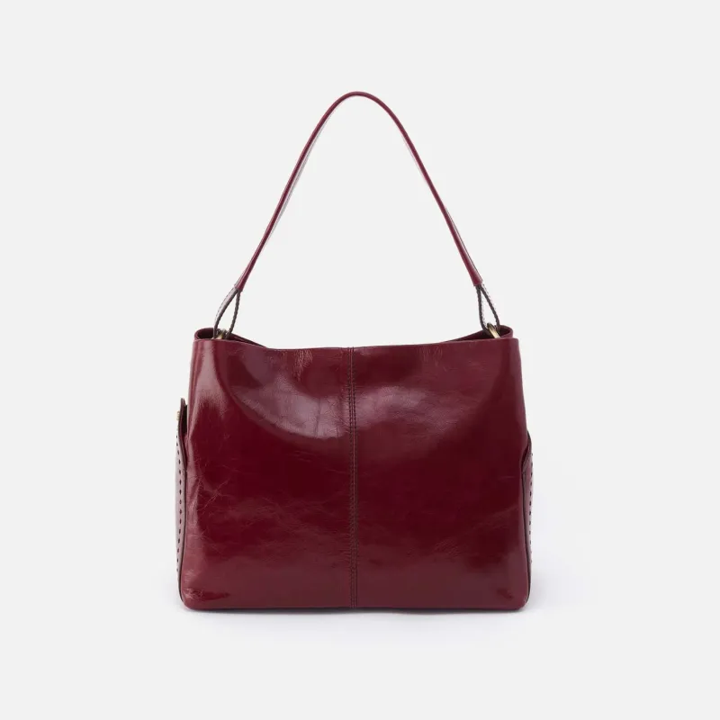 Seneca Shoulder Bag in Polished Leather - Saddleberry sold by HOBO