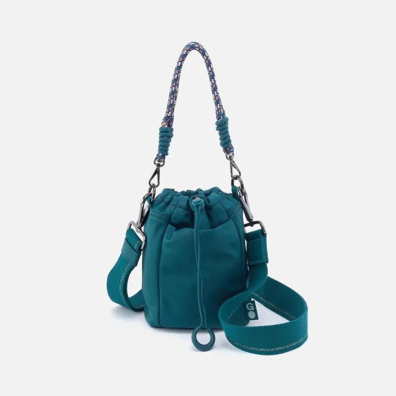 QUICK CINCH CROSSBODY in CaRefiber recycled nylon - Teal sold by HOBO