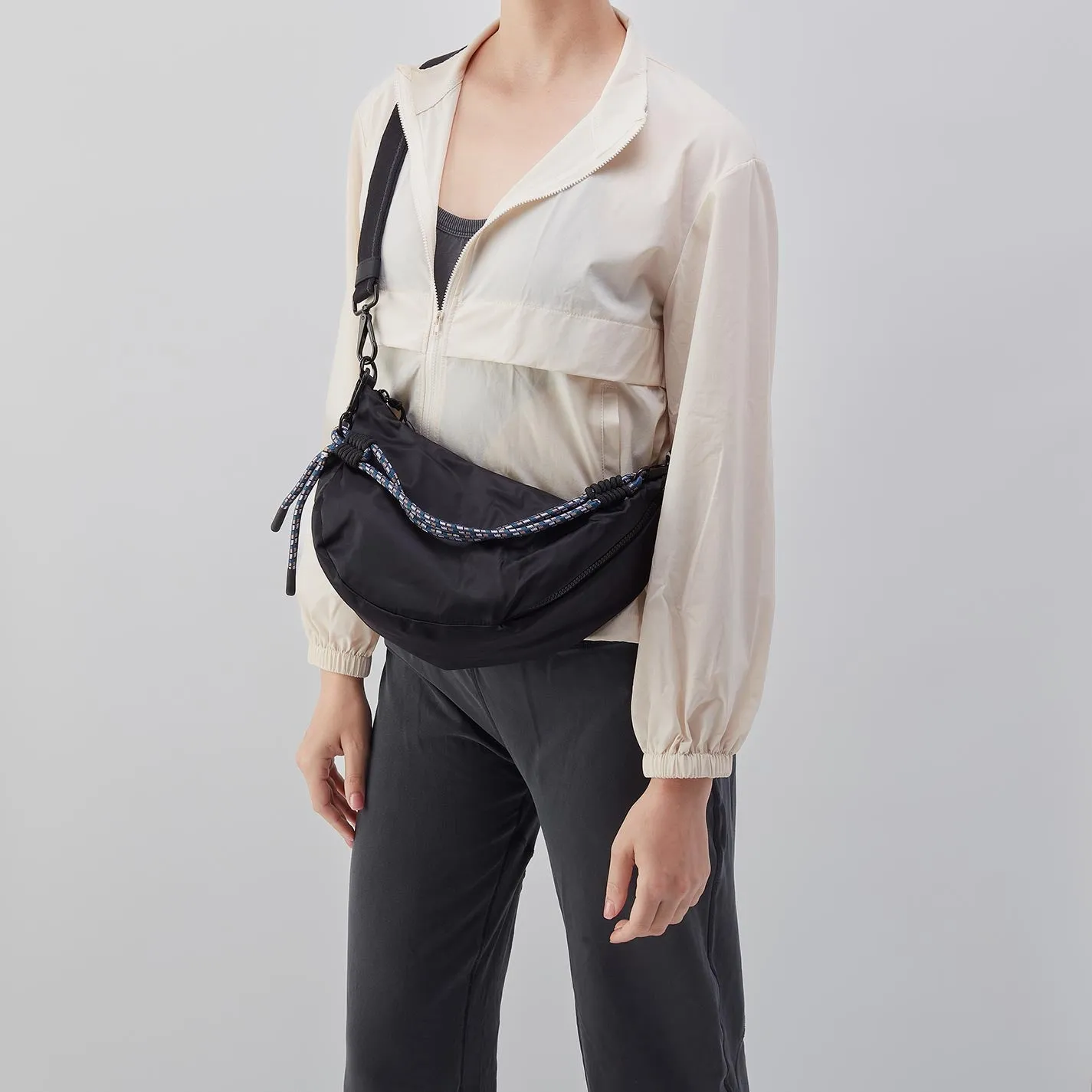 GO FOR IT Sling Crossbody in CaRefiber recycled nylon - Jet sold by HOBO product image thumbnail 4