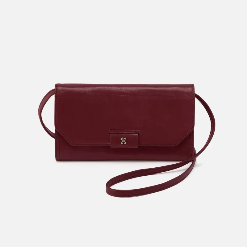 Romy Wallet Crossbody in Polished Leather - Saddleberry sold by HOBO