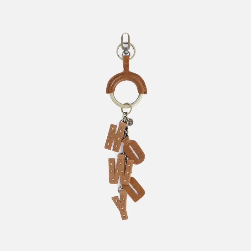 Howdy Charm Fob in Polished Leather - Truffle sold by HOBO