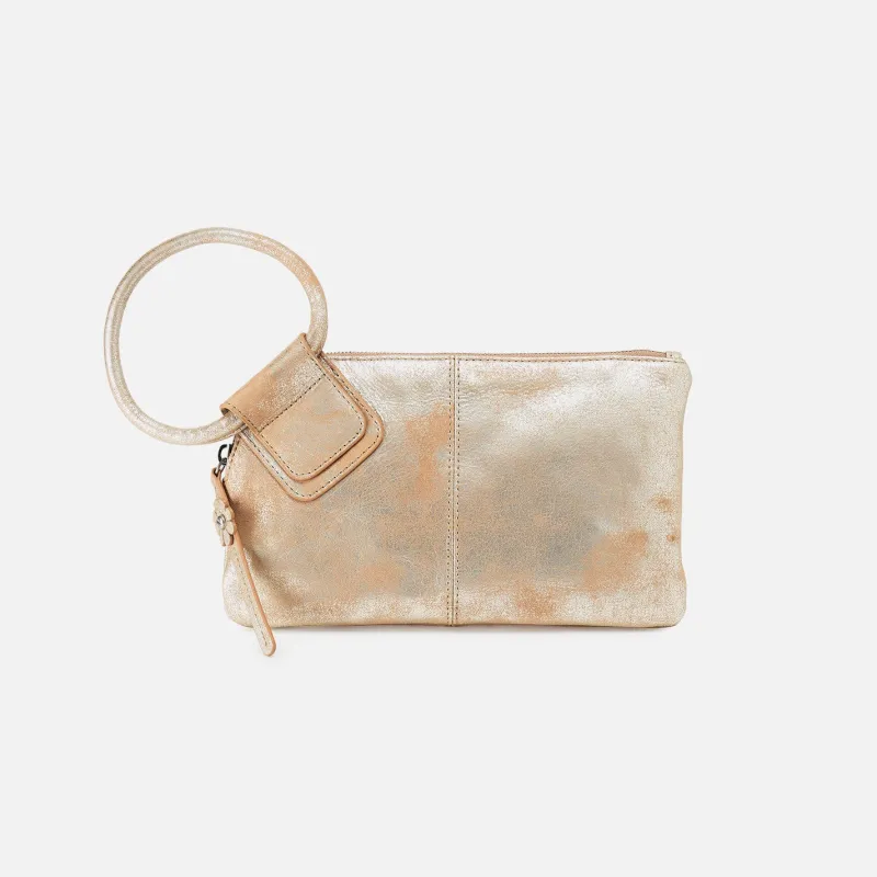 Sable Wristlet In Metallic Leather - Saddle Stardust sold by HOBO
