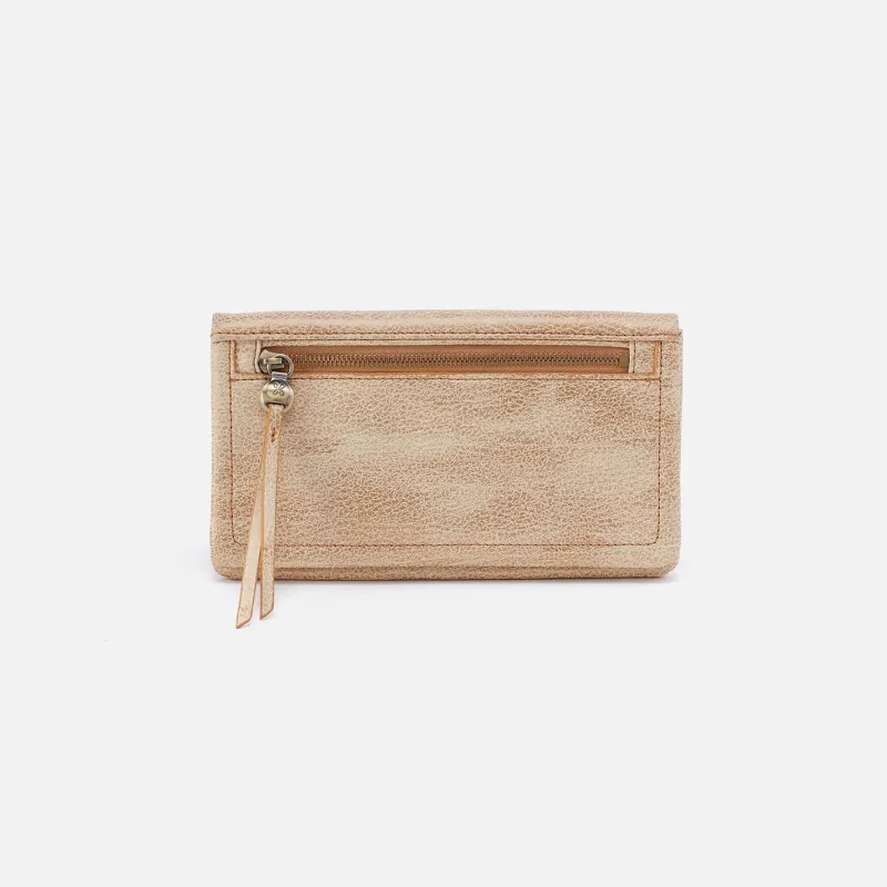 Lumen Continental Wallet In Metallic Leather - Gold Leaf sold by HOBO