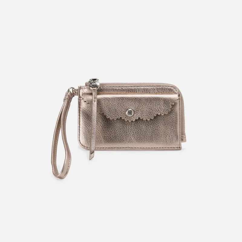 Tabby Card Wristlet In Metallic Leather - Cameo Quartz sold by HOBO