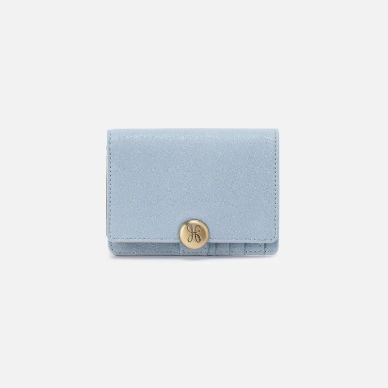 Hutton Small Wallet In Micrograin Leather - Dusted Sky made by HOBO