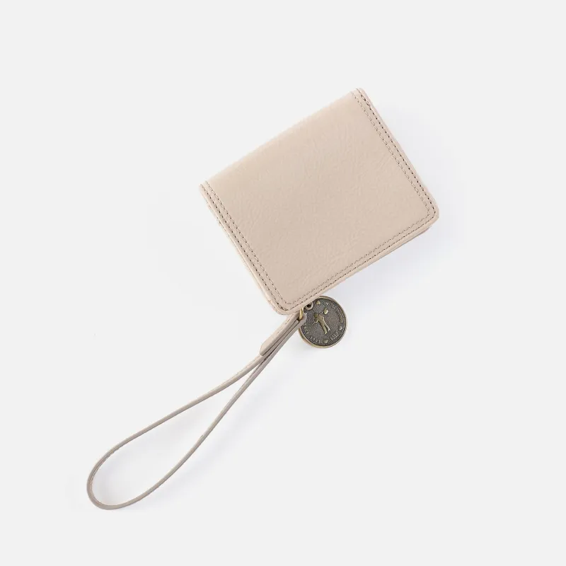 Coin Wristlet Wallet In Gloss Leather - Stone Gloss sold by HOBO