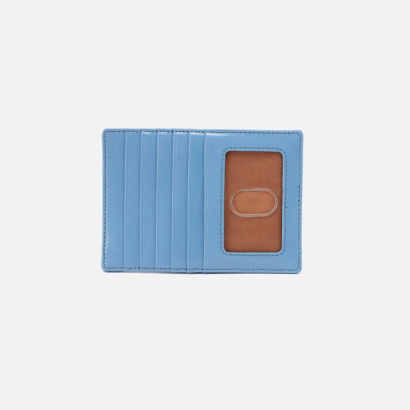 Euro Slide Card Case In Polished Leather - Faded Denim made by HOBO