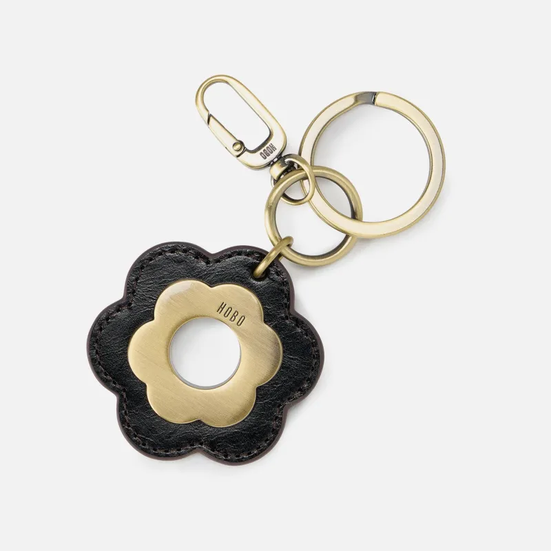 Daisy Keychain in Polished Leather - Black made by HOBO